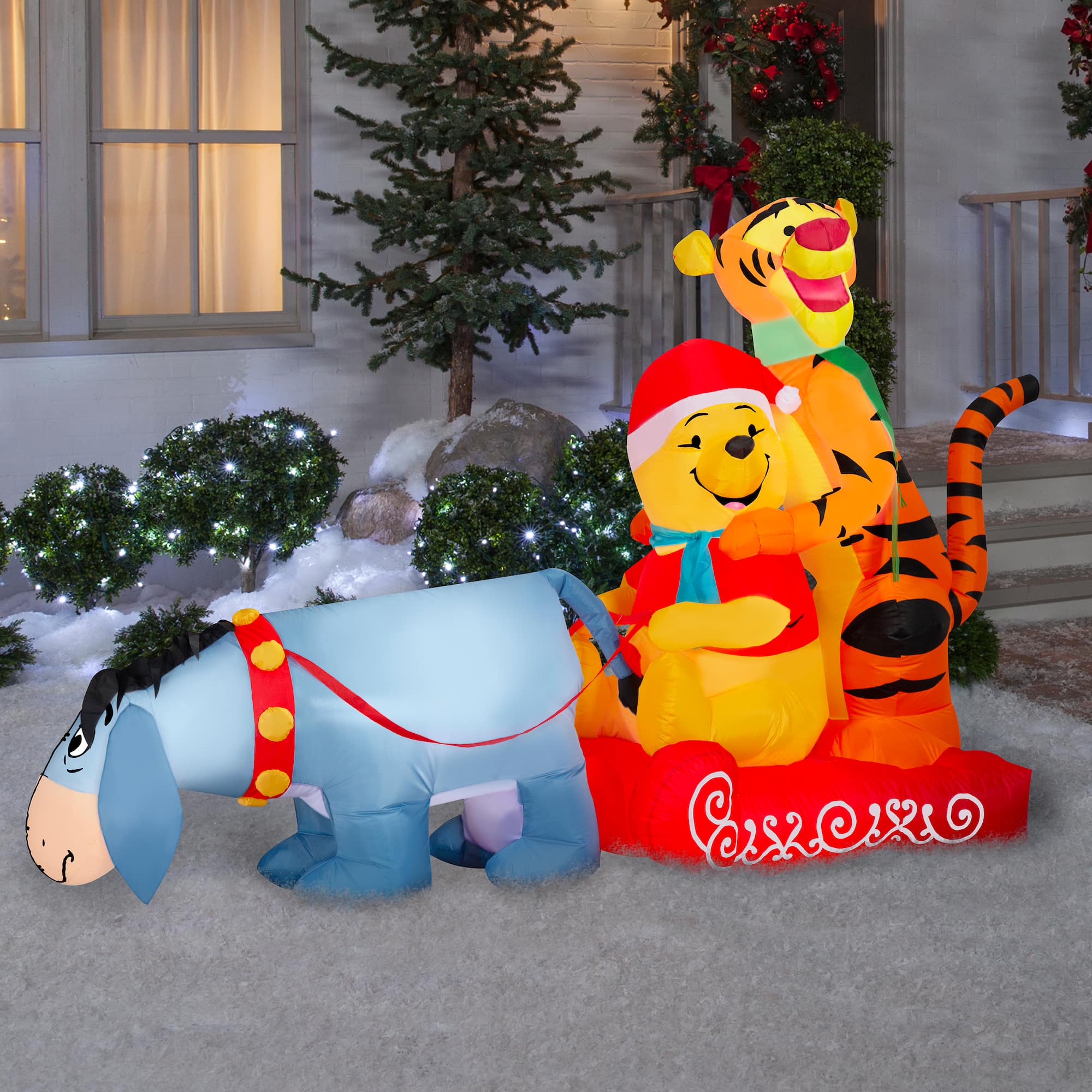 8ft. Airblown Inflatable Christmas Winnie the Pooh in Sledding Scene with Pooh, Eeyore & Tigger